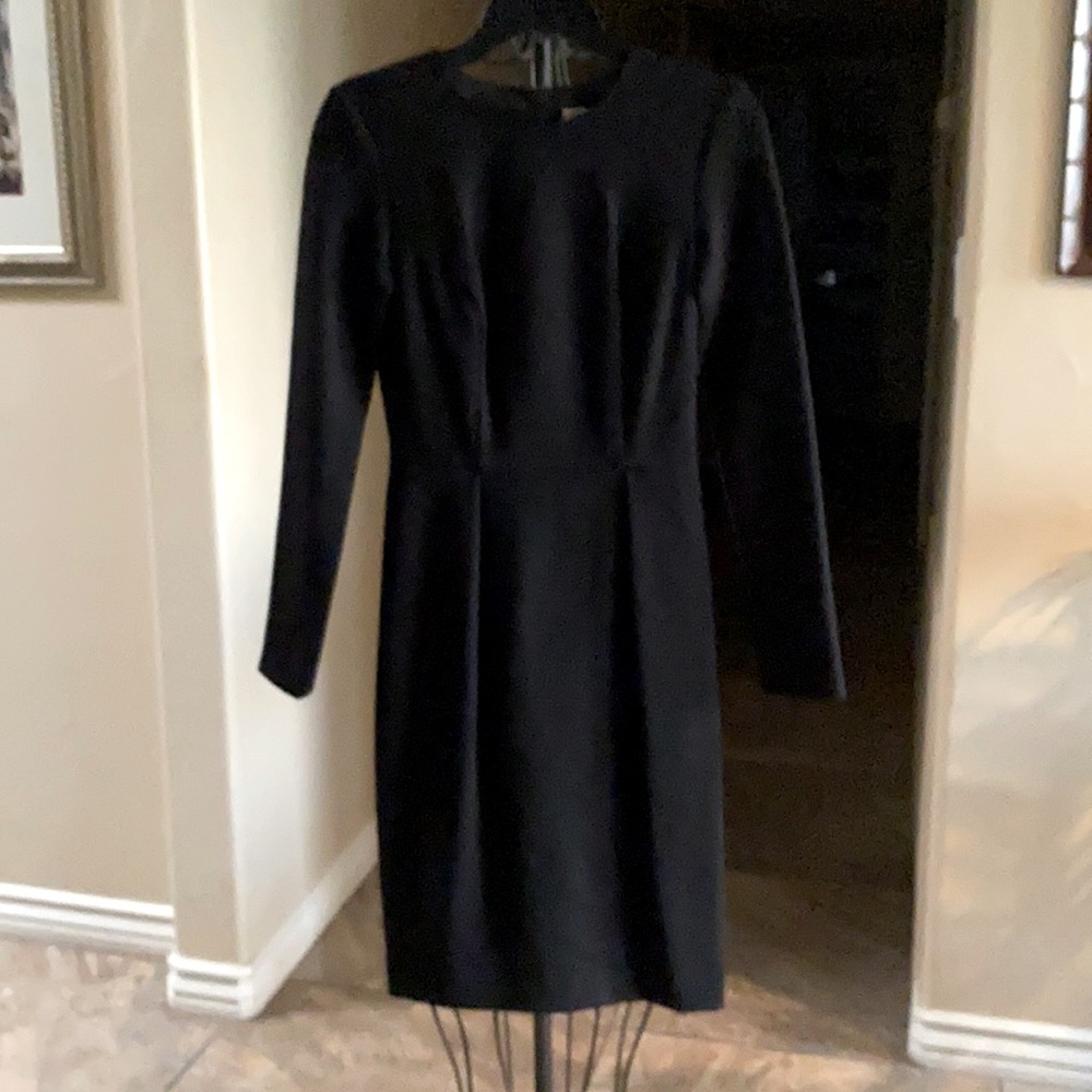 Trina Turk long sleeved with small slit in back